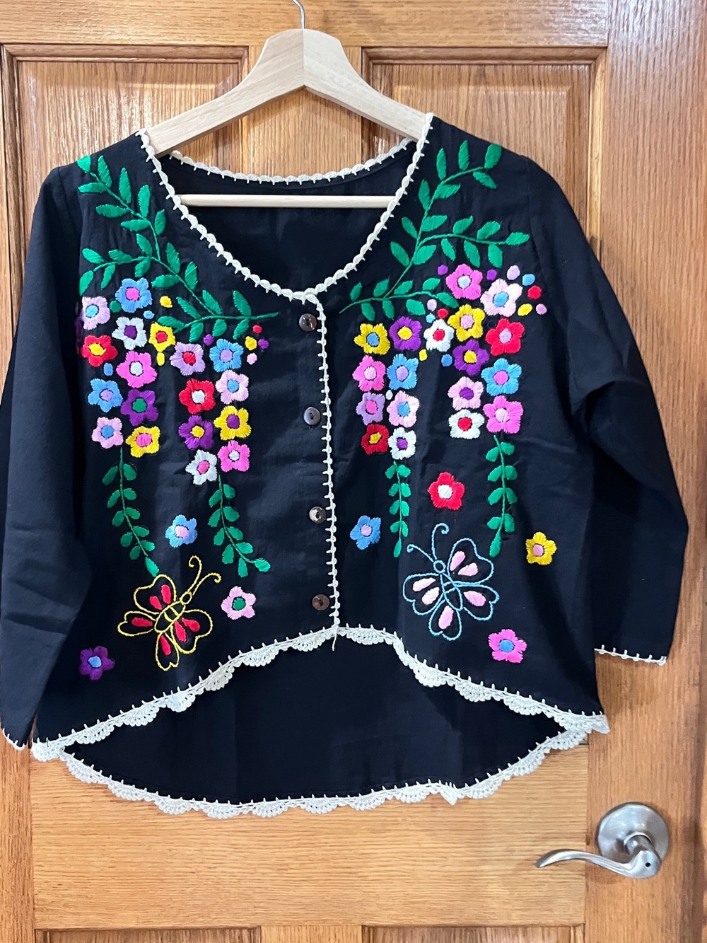 Elegant Embroidered Floral Black Button-Front Top with Lace Trim